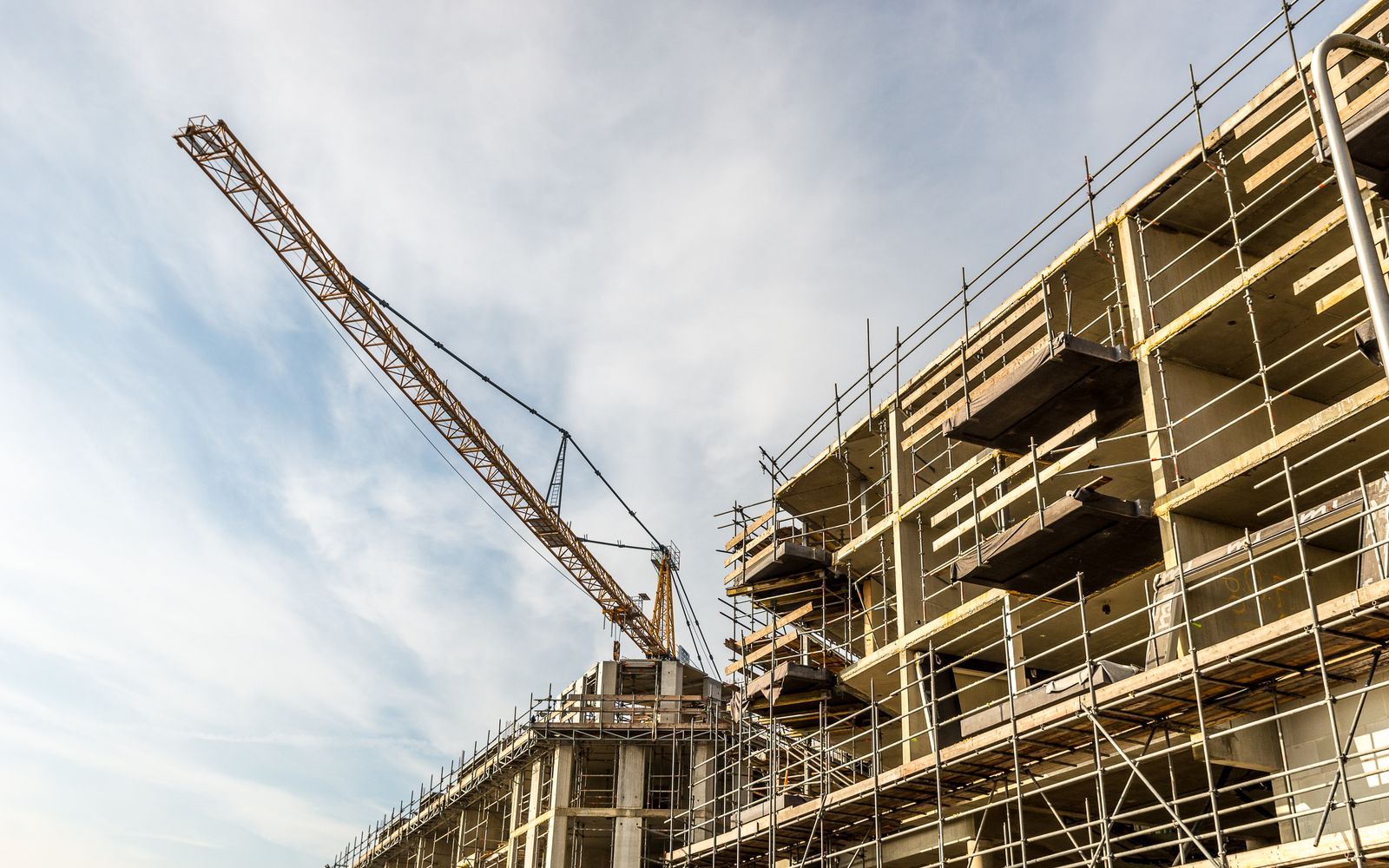 Tower crane over a multi-storey building under construction