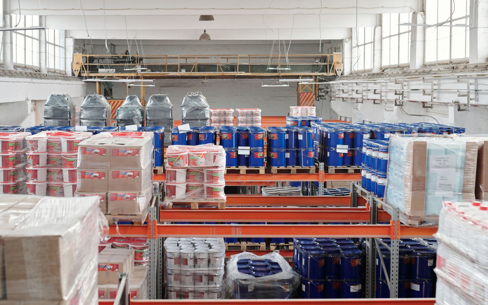 Warehouse racking stacked with palletised goods